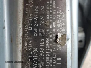 2004 Hyundai Accent GL z VIN KMHCG45C94U574027, wystawiony jako Copart lot #57463905 z przebiegiem 139 595 mil mil oraz Szkoda całkowita • Salvage title. Historia ofert i sprzedaży dostępna na DreamBid. Obrazek 13.