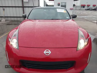 2016 Nissan 370Z z VIN JN1AZ4EHXGM932681, wystawiony jako IAAI lot #42350850 z przebiegiem 94 586 mil mil oraz . Historia ofert i sprzedaży dostępna na DreamBid. Obrazek 12.