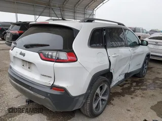 2019 Jeep Cherokee Limited with VIN 1C4PJMDX1KD197833, listed as a IAAI auction lot 42027945 with 153,053 mi miles and . Bid and sale history available at DreamBid. Image 4.