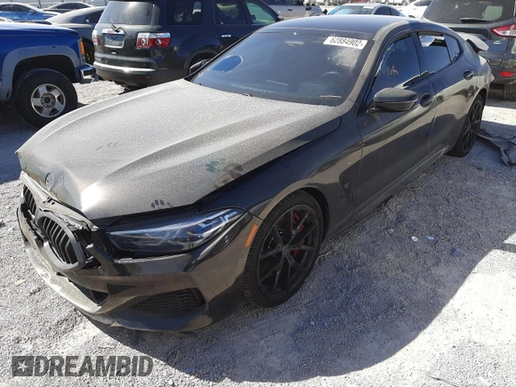 2020 BMW 8 Series M850i with VIN WBAGV8C04LBP48797, listed as a Copart auction lot 62884902 with 23,894 mi miles. Bid and sale history available at carsss.com. Image 2.