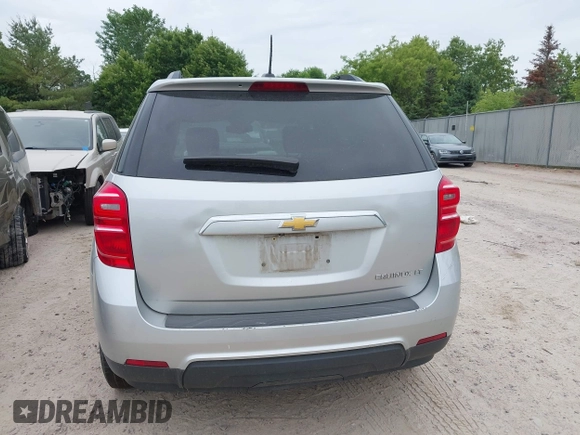 2016 Chevrolet Equinox LT z VIN 2GNALCEK9G1168510, wystawiony jako IAAI lot #42445901 z przebiegiem 165 031 mil mil oraz . Historia ofert i sprzedaży dostępna na DreamBid. Obrazek 16.