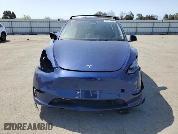 2023 Tesla Model Y Long Range with VIN 7SAYGAEE8PF927092, listed as a Copart auction lot 53917185 with 17,639 mi miles and Salvage Title. Bid and sale history available at DreamBid. Image 5.
