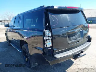 2017 Chevrolet Suburban Premier with VIN 1GNSKJKC8HR285321, listed as a IAAI auction lot 41796659 with 128,113 mi miles and . Bid and sale history available at DreamBid. Image 6.