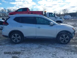 2018 Nissan Rogue S with VIN 5N1AT2MT2JC738034, listed as a IAAI auction lot 41286839 with 125,037 mi miles and . Bid and sale history available at DreamBid. Image 13.