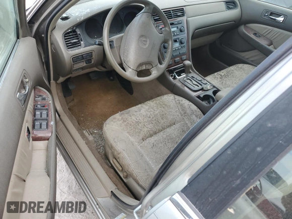 2002 Acura RL with VIN JH4KA96562C001280, listed as a Copart auction lot 74716484 with 0 mi miles and Salvage Title. Bid and sale history available at carsss.com. Image 8.