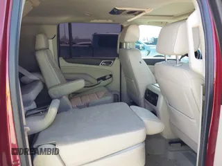 2020 GMC Yukon XL Denali with VIN 1GKS1HKJ3LR238701, listed as a IAAI auction lot 41724274 with 107,323 mi miles and . Bid and sale history available at DreamBid. Image 8.