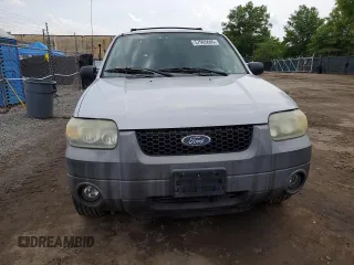 2005 Ford Escape Hybrid with VIN 1FMCU96H55KC74059, listed as a Copart auction lot 57065685 with 154,807 mi miles and Salvage title. Bid and sale history available at DreamBid. Image 5.