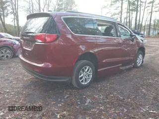 2021 Chrysler Voyager LXi with VIN 2C4RC1DG1MR556020, listed as a IAAI auction lot 41044760 with 6,286 mi miles and . Bid and sale history available at DreamBid. Image 4.