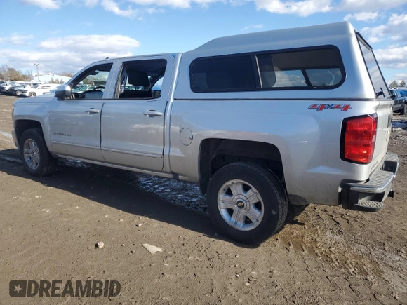 2017 Chevrolet Silverado 1500 LT with VIN 3GCUKREC3HG320455, listed as a Copart auction lot 43765005 with 119,683 mi miles and Salvage Title. Bid and sale history available at DreamBid. Image 2.