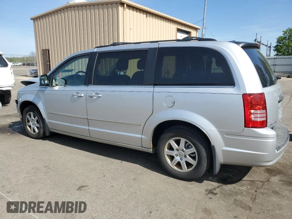 2010 Chrysler Town & Country Touring Plus with VIN 2A4RR8D18AR394752, listed as a Copart auction lot 52367295 with 157,320 mi miles and Salvage Title. Bid and sale history available at DreamBid. Image 2.