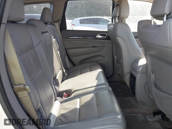 2011 Jeep Grand Cherokee Laredo with VIN 1J4RS4GGXBC517068, listed as a IAAI auction lot 42173780 with 170,688 mi miles and . Bid and sale history available at DreamBid. Image 8.