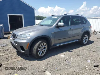 2012 BMW X5 35i с VIN 5UXZV4C58CL761285, выставлен на аукционе Copart как лот 64886705 с пробегом 138 571 миль миль и Чистый • Clean title. История ставок и продаж доступна на DreamBid. Изображение 1.