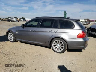 2011 BMW 3 Series 328i with VIN WBAUT9C52BA191581, listed as a Copart auction lot 82901954 with 164,378 mi miles and Clean title. Bid and sale history available at DreamBid. Image 2.