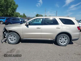 2014 Dodge Durango SXT with VIN 1C4RDJAG0EC455787, listed as a IAAI auction lot 42651627 with 103,218 mi miles and . Bid and sale history available at DreamBid. Image 14.