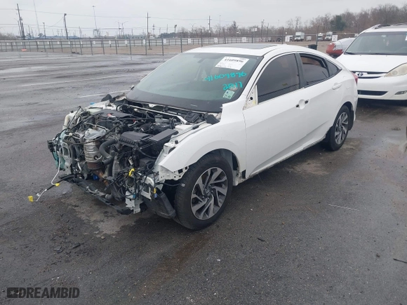 2017 Honda Civic Sedan EX with VIN 19XFC2F75HE080691, listed as a IAAI auction lot 41609896 with 79,648 mi miles. Bid and sale history available at carsss.com. Image 2.