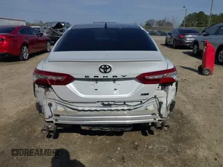 2020 Toyota Camry XSE with VIN 4T1K61AK8LU987937, listed as a IAAI auction lot 41604530 with 102,967 mi miles and . Bid and sale history available at DreamBid. Image 6.