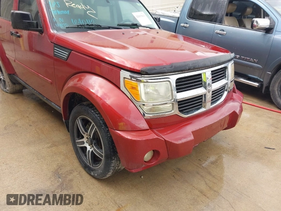 2007 Dodge Nitro SLT with VIN 1D8GT58K77W640112, listed as a IAAI auction lot 42015613 with 220,061 mi miles. Bid and sale history available at carsss.com. Image 6.