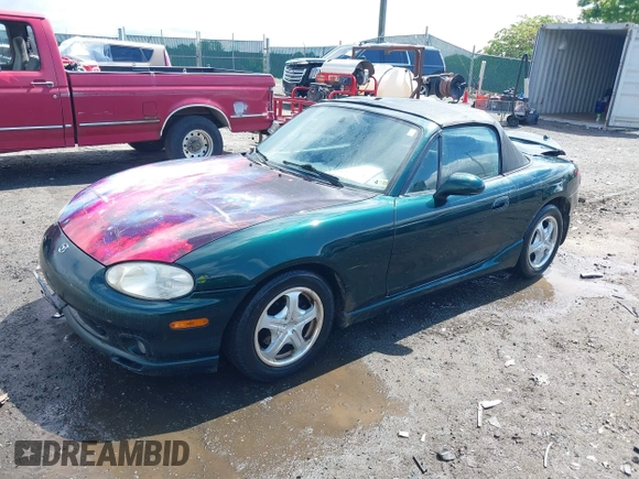 1999 Mazda MX-5 Miata z VIN JM1NB3537X0123440, wystawiony jako IAAI lot #42263294 z przebiegiem 107 356 mil mil oraz . Historia ofert i sprzedaży dostępna na DreamBid. Obrazek 2.