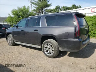 2015 GMC Yukon XL SLT with VIN 1GKS2HKCXFR305300, listed as a Copart auction lot 57120804 with 155,910 mi miles and Clean Title. Bid and sale history available at carsss.com. Image 2.