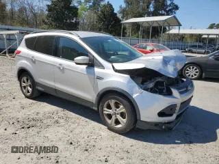 2014 Ford Escape SE with VIN 1FMCU0GX7EUA42763, listed as a Copart auction lot 49494285 with 227,059 mi miles and Salvage Title. Bid and sale history available at carsss.com. Image 4.