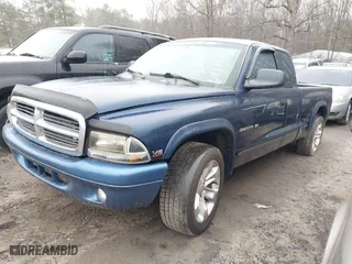 2002 Dodge Dakota SLT with VIN 1B7GL42X72S649714, listed as a IAAI auction lot 41426396 with 227,056 mi miles. Bid and sale history available at carsss.com. Image 2.