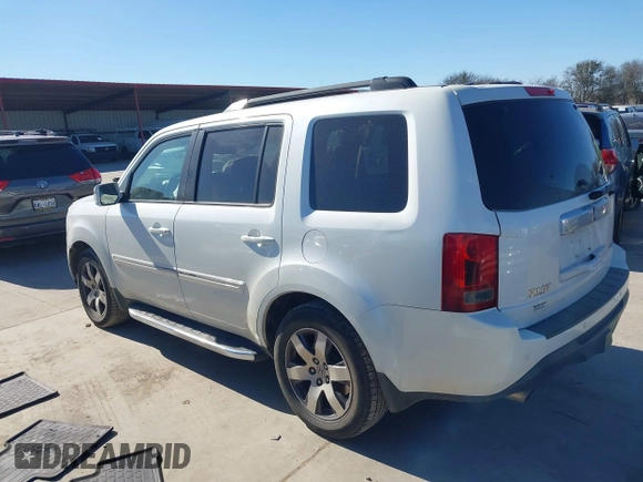 2012 Honda Pilot Touring with VIN 5FNYF3H91CB020673, listed as a IAAI auction lot 41721836 with 123,607 mi miles and . Bid and sale history available at carsss.com. Image 3.