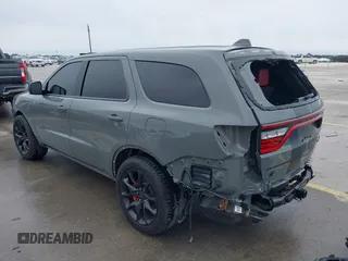 2021 Dodge Durango SRT Hellcat with VIN 1C4SDJH92MC605759, listed as a IAAI auction lot 41639174 with 4,800 mi miles and . Bid and sale history available at DreamBid. Image 3.