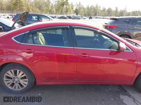 2009 Mazda 6 i Grand Touring with VIN 1YVHP82A495M04111, listed as a IAAI auction lot 42031522 with 251,839 mi miles. Bid and sale history available at carsss.com. Image 14.