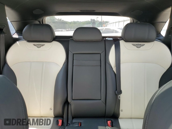 2019 Bentley Bentayga V8 z VIN SJAAM2ZV0KC026362, wystawiony jako Copart lot #54059393 z przebiegiem 31 530 mil mil oraz . Historia ofert i sprzedaży dostępna na DreamBid. Obrazek 10.