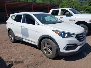 2018 Hyundai Santa Fe 2.4L with VIN 5NMZT3LB6JH088065, listed as a IAAI auction lot 42315723 with 92,900 mi miles and . Bid and sale history available at DreamBid. Image 1.
