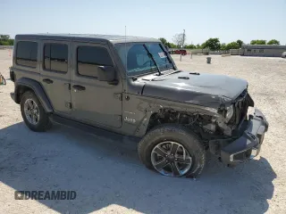 2022 Jeep Wrangler Unlimited Sahara with VIN 1C4HJXEG8NW164969, listed as a Copart auction lot 52241645 with 64,263 mi miles and Salvage title. Bid and sale history available at DreamBid. Image 4.