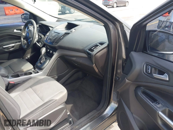 2015 Ford Escape SE with VIN 1FMCU0G75FUC20011, listed as a IAAI auction lot 42113751 with 182,516 mi miles. Bid and sale history available at carsss.com. Image 5.
