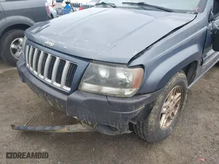 2004 Jeep Grand Cherokee Laredo with VIN 1J4GX48S64C291075, listed as a IAAI auction lot 41805747 with 282,384 mi miles. Bid and sale history available at carsss.com. Image 6.