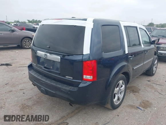 2012 Honda Pilot EX-L with VIN 5FNYF4H52CB070811, listed as a IAAI auction lot 41938672 with 156,446 mi miles and . Bid and sale history available at DreamBid. Image 4.