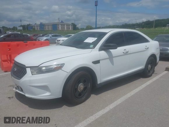 2013 Ford Police Interceptor z VIN 1FAHP2M86DG160039, wystawiony jako IAAI lot #42377823 z przebiegiem 143 131 mil mil oraz . Historia ofert i sprzedaży dostępna na DreamBid. Obrazek 2.