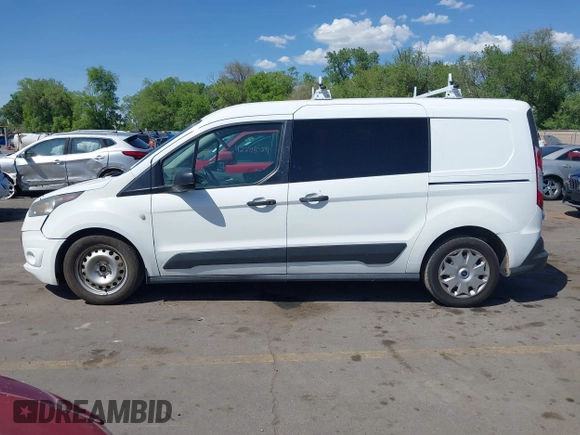 2015 Ford Transit Connect XLT z VIN NM0LS7F79F1203215, wystawiony jako IAAI lot #42217772 z przebiegiem 217 186 mil mil oraz . Historia ofert i sprzedaży dostępna na DreamBid. Obrazek 14.