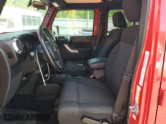 2012 Jeep Wrangler Unlimited Sahara with VIN 1C4BJWEG0CL128417, listed as a Copart auction lot 56243815 with 95,635 mi miles and Salvage title. Bid and sale history available at DreamBid. Image 7.