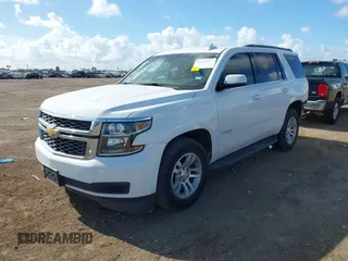2019 Chevrolet Tahoe LT z VIN 1GNSCBKC0KR393975, wystawiony jako IAAI lot #41129927 z przebiegiem 119 470 mil mil oraz . Historia ofert i sprzedaży dostępna na DreamBid. Obrazek 18.
