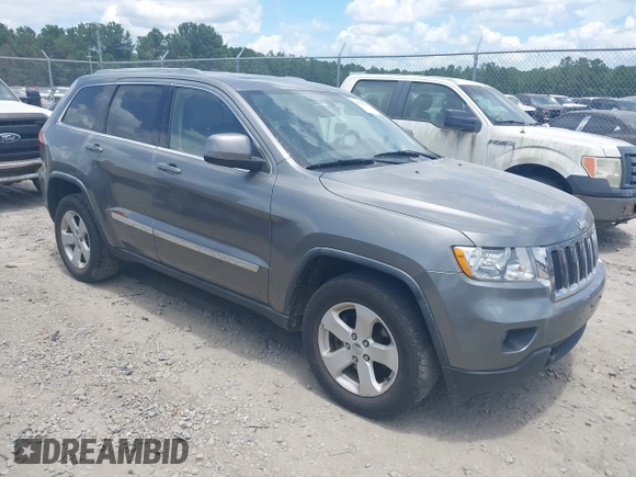 2011 Jeep Grand Cherokee Laredo with VIN 1J4RR4GG3BC595896, listed as a IAAI auction lot 42632333 with 135,426 mi miles and . Bid and sale history available at DreamBid. Image 1.