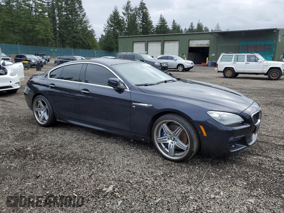 2013 BMW 6 Series 650i with VIN WBA6B2C50DD128242, listed as a Copart auction lot 44441885 with 107,960 mi miles and Salvage Title. Bid and sale history available at DreamBid. Image 4.