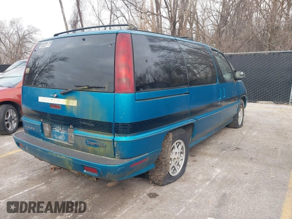 1995 Oldsmobile Silhouette z VIN 1GHDU06L5ST302709, wystawiony jako IAAI lot #41118652 z przebiegiem 228 338 mil mil oraz . Historia ofert i sprzedaży dostępna na DreamBid. Obrazek 4.