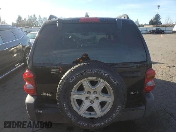 2003 Jeep Liberty Sport with VIN 1J4GK48KX3W658457, listed as a Copart auction lot 41863855 with 194,747 mi miles and Salvage Title. Bid and sale history available at DreamBid. Image 6.