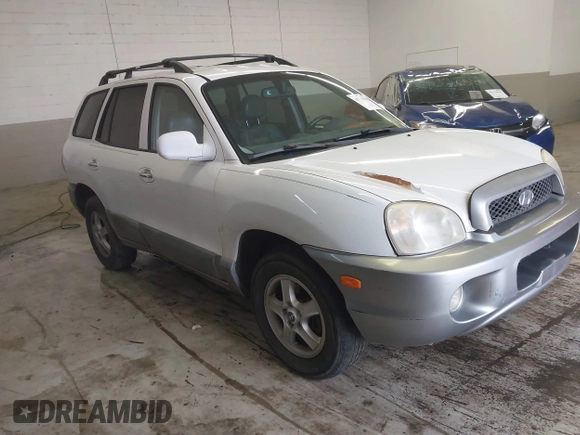 2004 Hyundai Santa Fe GLS with VIN KM8SC13E44U797943, listed as a IAAI auction lot 41731356 with 184,139 mi miles. Bid and sale history available at carsss.com. Image 1.