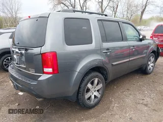 2012 Honda Pilot Touring with VIN 5FNYF4H98CB065003, listed as a IAAI auction lot 41989829 with 91,607 mi miles and . Bid and sale history available at DreamBid. Image 4.