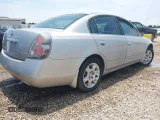 2006 Nissan Altima S with VIN 1N4AL11D66N302106, listed as a IAAI auction lot 42307385 with 153,515 mi miles and . Bid and sale history available at DreamBid. Image 4.
