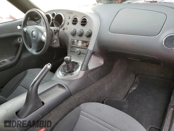 2007 Pontiac Solstice z VIN 1G2MB35BX7Y131055, wystawiony jako Copart lot #50137595 z przebiegiem 48 887 mil mil oraz Szkoda całkowita • Salvage title. Historia ofert i sprzedaży dostępna na DreamBid. Obrazek 8.