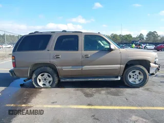2004 Chevrolet Tahoe LT with VIN 1GNEC13Z24J170834, listed as a IAAI auction lot 41149637 with 362,679 mi miles and . Bid and sale history available at DreamBid. Image 13.