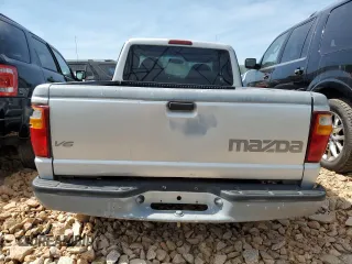 2003 Mazda B-Series Truck DS z VIN 4F4YR16V03TM05710, wystawiony jako Copart lot #54114605 z przebiegiem 187 857 mil mil oraz Szkoda całkowita • Salvage title. Historia ofert i sprzedaży dostępna na DreamBid. Obrazek 6.