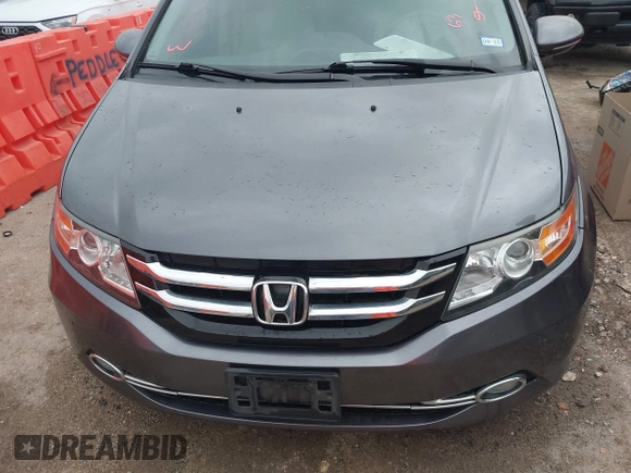 2016 Honda Odyssey Touring Elite with VIN 5FNRL5H96GB063176, listed as a IAAI auction lot 42157604 with 106,177 mi miles. Bid and sale history available at carsss.com. Image 12.