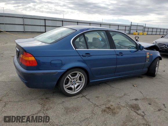 2003 BMW 3 Series 330i with VIN WBAEV53483KM02597, listed as a Copart auction lot 50743335 with 167,968 mi miles and Salvage Title. Bid and sale history available at carsss.com. Image 3.